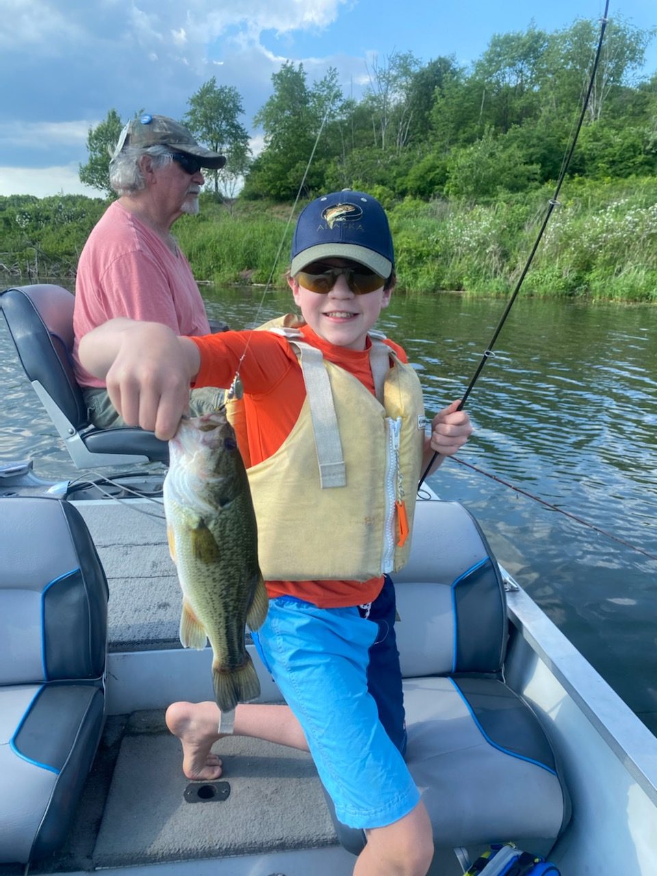 2 pound largemouth out of Colyer Lake on a silver-yellow Timberwolf