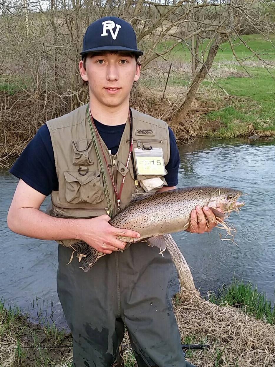 Logan with a 24-incher from Penns Creek, on that plain gold again