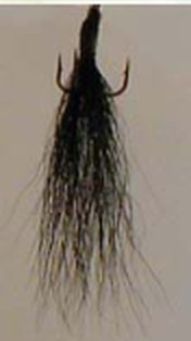 Long hand-tied black tail for a Timberwolf spinner.