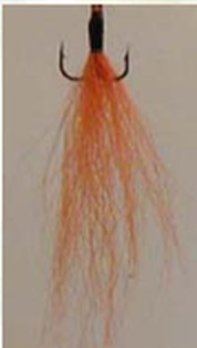 Long hand-tied orange tail for a Timberwolf spinner.