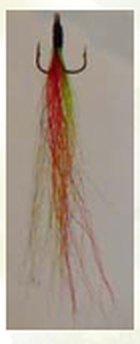 Custom Timberwolf spinner with a long red, green and white tail.