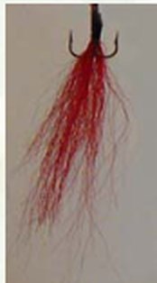 Long hand-tied red tail for a Timberwolf spinner.